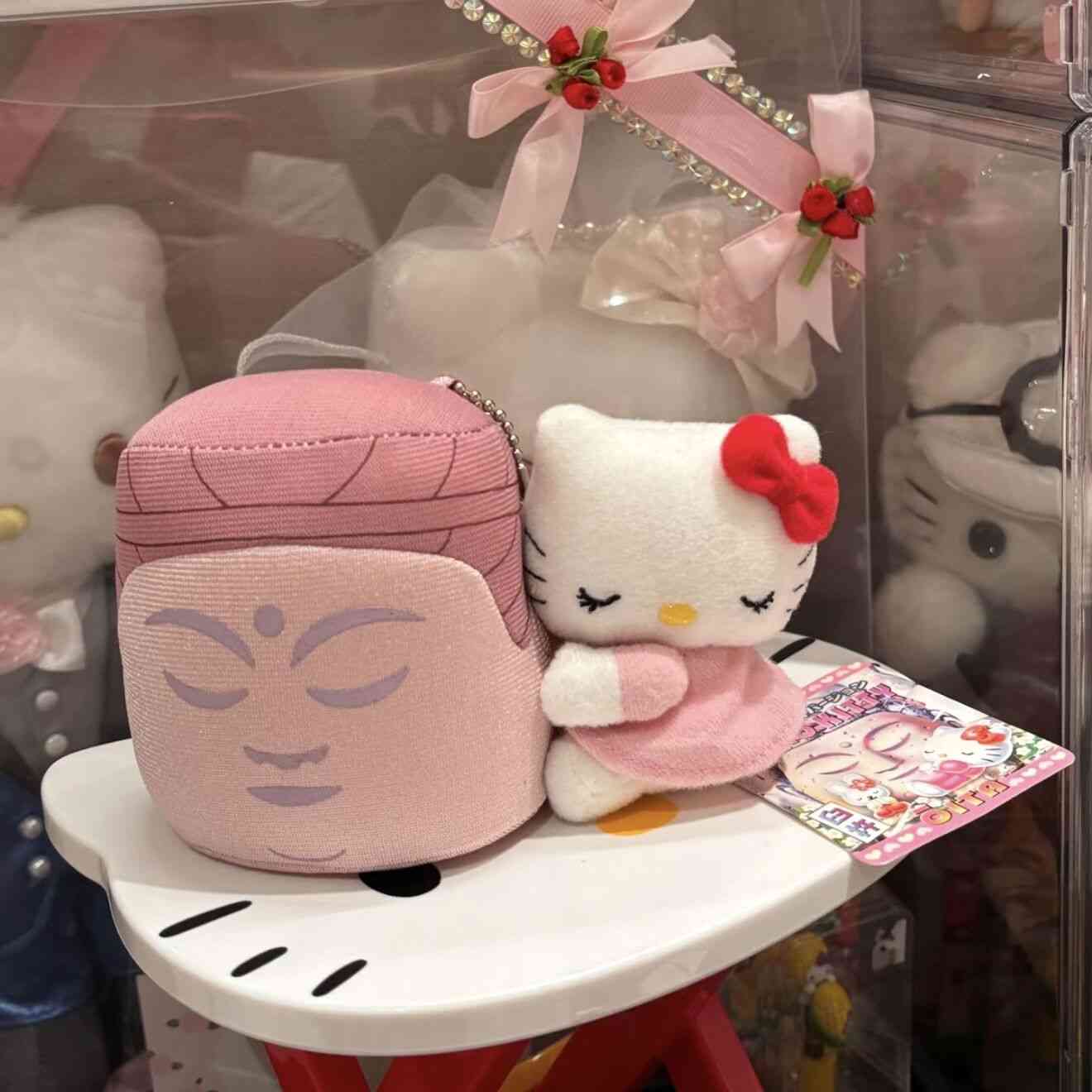 Thumbnail of Vintage Sanrio Hello Kitty Hugging Budda Mascot Charm